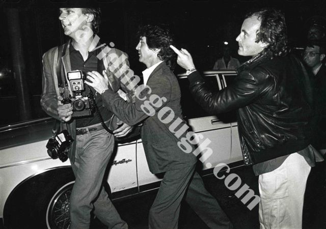 Phil Collins attacking photographer 1985, NY.jpg